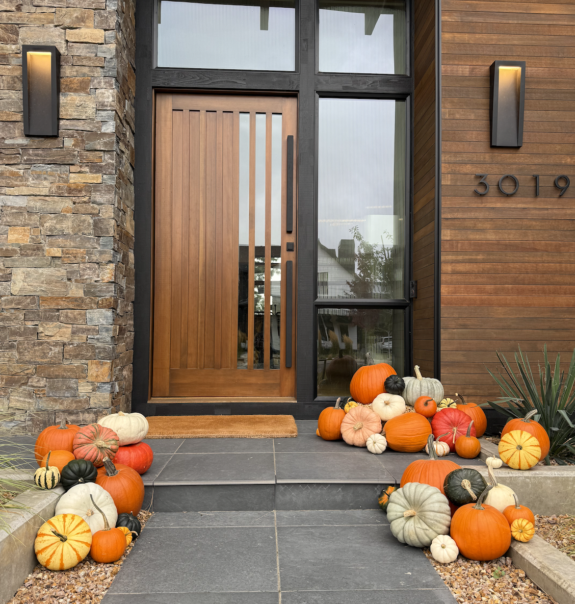 Screenshot 2025-09-14 at 4.15.57 PM pumpkins on porch